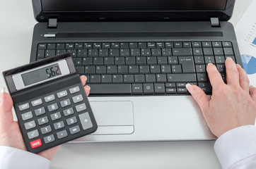 Accountant woman working on financial results