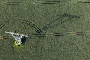 Aerial view of electrical wires large scale power energy tower