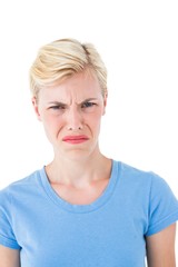 Furious blonde woman looking at camera