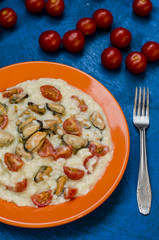 Risotto with seafood and tomatoes 