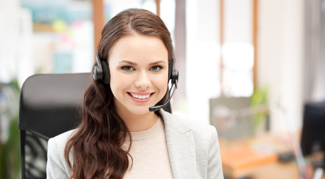 smiling female helpline operator with headset