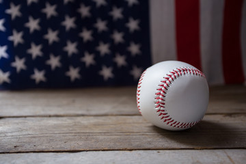 baseball with American flag in the background