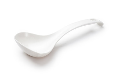 plastic kitchen spoon isolated on white background