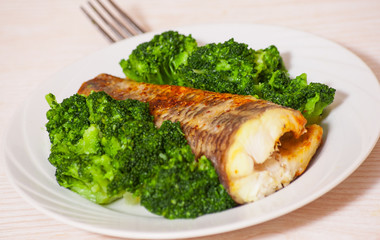 fried fish with broccoli