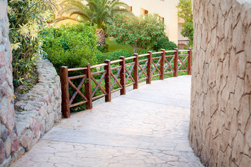 stone road for a walk with a handrail