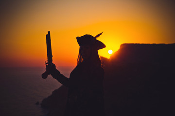 Portrait of a pirate woman at the beach