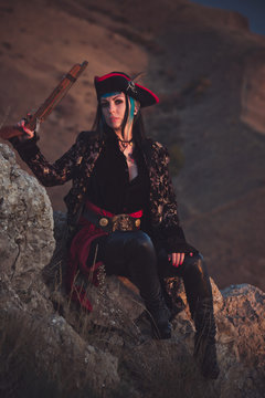 Portrait of a pirate woman at the beach