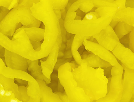 Canned banana peppers close view