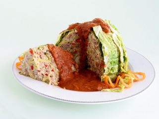 stuffed cabbage with porridge ,meat and vegetables and sauce