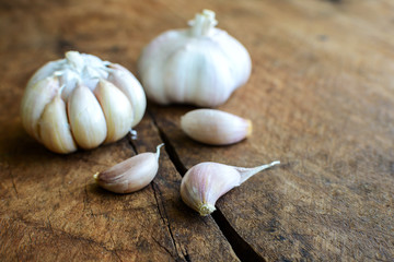 Close up of garlic on old wooden