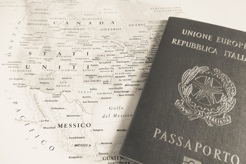 Italian passport over USA map