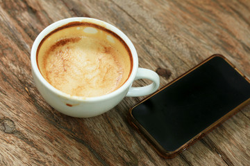 Dinking coffee with smart phone