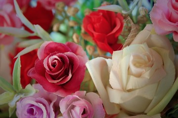 Beautiful vintage roses of artificial flowers