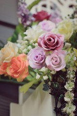 Beautiful vintage roses of artificial flowers