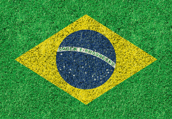 Brazil flag texture on green grass