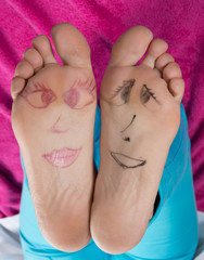 Happy and funny couple summer feet