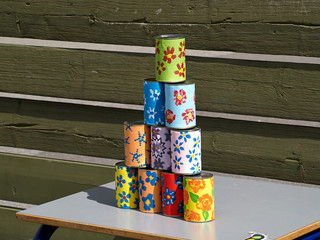 Pyramid of tin cans for throwing balls at them