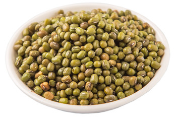 Mung beans in white bowl over white background