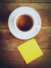 cup of coffee and short note paper