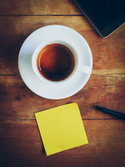 cup of coffee and short note paper