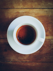 cup of coffee and short note paper