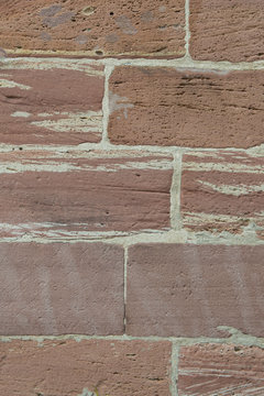 Wall masoned out of red sandstone