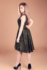 Fototapeta premium Beautiful woman in fashion military clothing