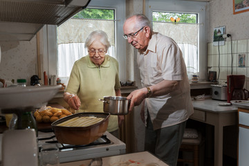 Elderly couple in the kitchen