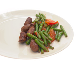 fried merguez sausages with green beans and tomatoes