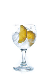 Cocktail with ice and lemon isolated on white background
