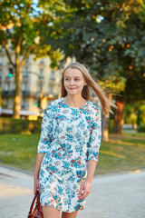 Naklejka premium Young beautiful and elegant Parisian woman