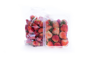 strawberry juicy fruit in plastic bag packaging isolated