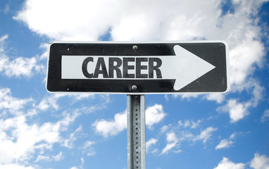 Career direction sign with sky background