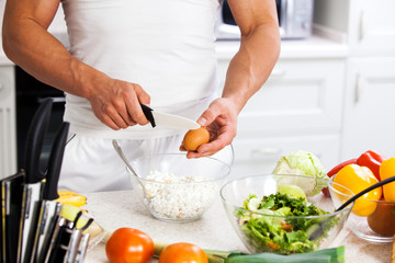 man cutting vegetables