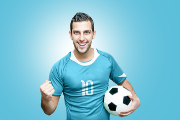 Fototapeta Uruguayan fan celebrates on blue background obraz