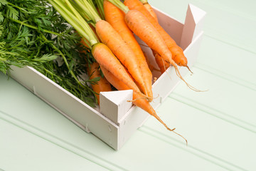 Carrots on wooden table