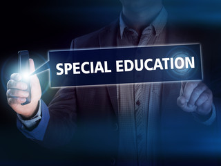 Businessman presses button special education on virtual screens. - obrazy, fototapety, plakaty