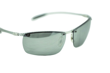 Carbon fiber sun glasses isolated on white.