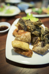 Japanese deep friend salmon and salmon skin with salt.