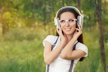 Girl with Headphones Listening to Music 