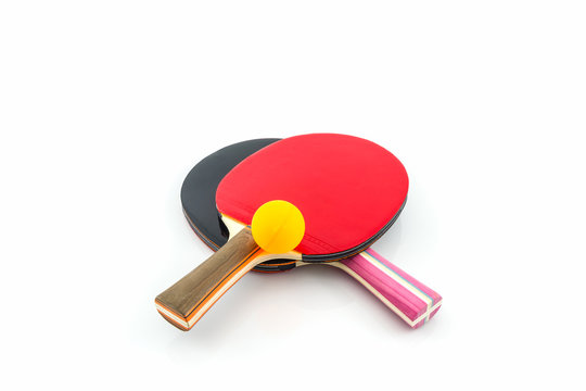 Table tennis (ping-pong) racket and a ball.