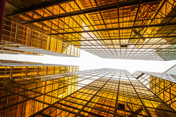 low angle view of modern skyscraper exterior and sky