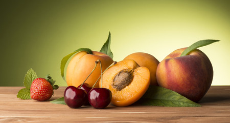 summer fruits on the wooden table
