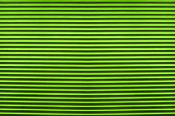 Fototapeta premium Texture of colorful green plastic shutters for abstract elements