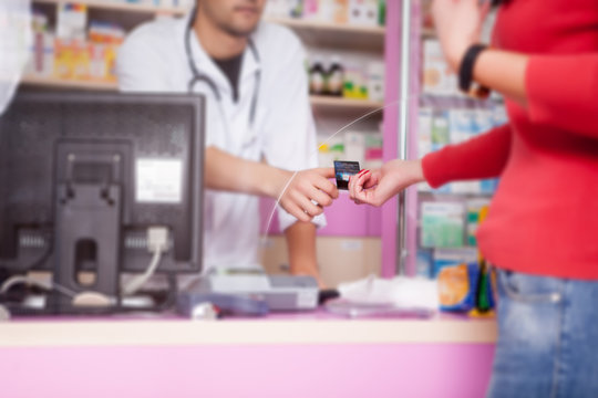 Business relations in pharmacy paying with credit card