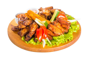 Fried chicken wings with vegetables
