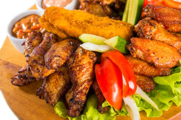 Fried chicken wings with vegetables
