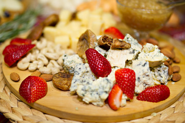 Still life picture with Georgian cheese and strawberries