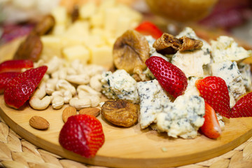 Still life picture with Georgian cheese and strawberries