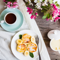 Homemade cottage cheese pancakes  with banana, condensed milk,br